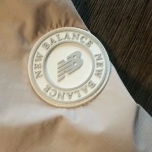 New balance tan jacket.